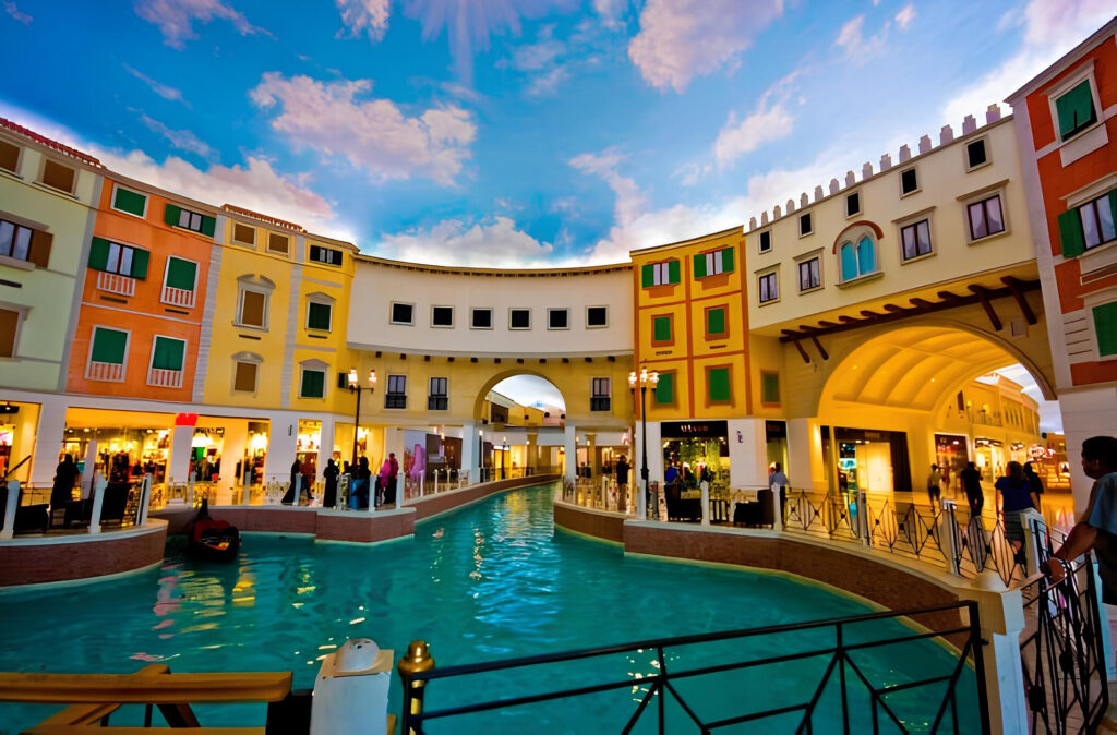 Immersive Venetian-style interior mural with canal, architecture and painted sky ceiling in Doha, Qatar